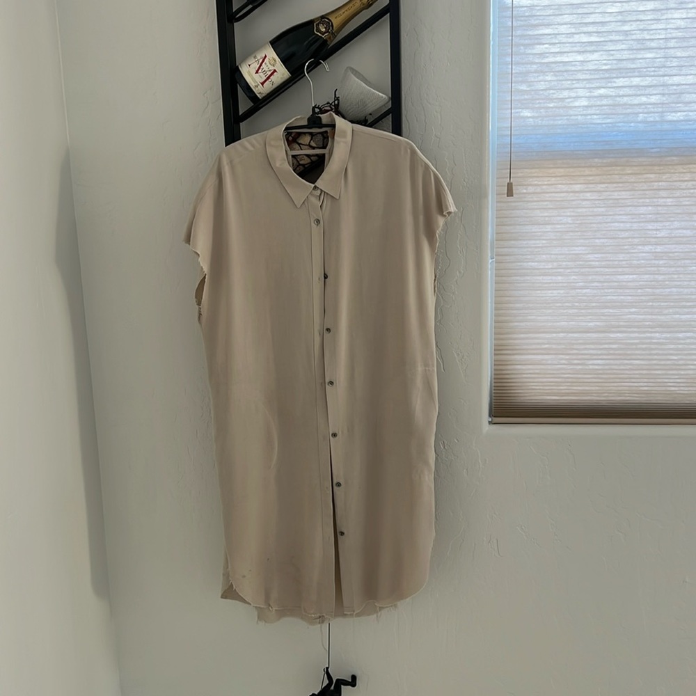 Tan looks nice on, has pockets